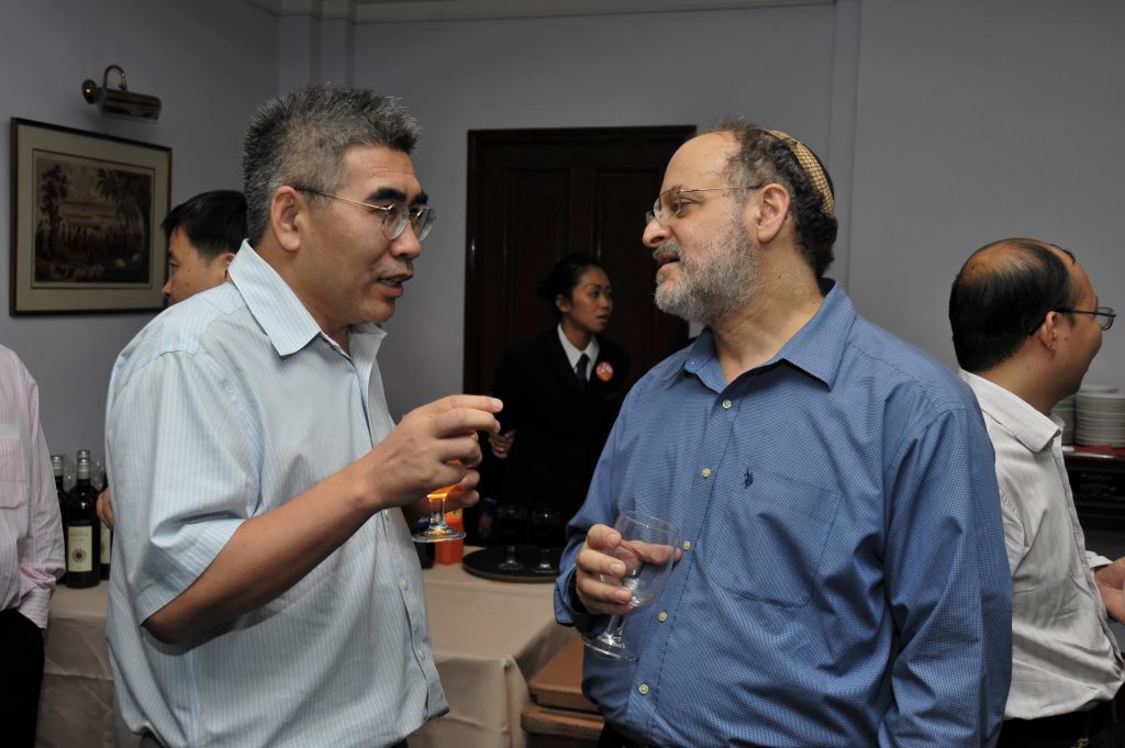 At the reception: (From left) ZHANG Louxin, David SROLOVITZ